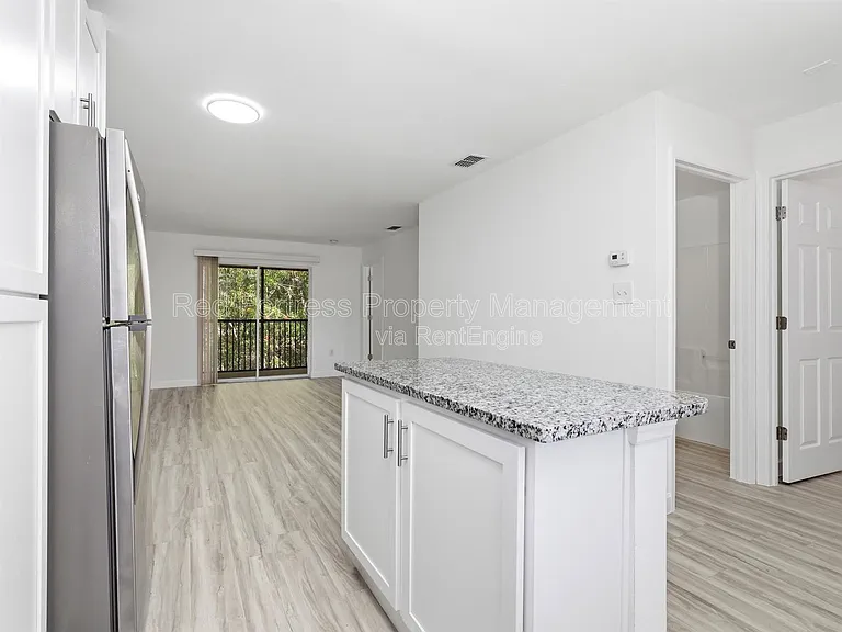 11931 Palm Bay Ct #202 — Photo 3
