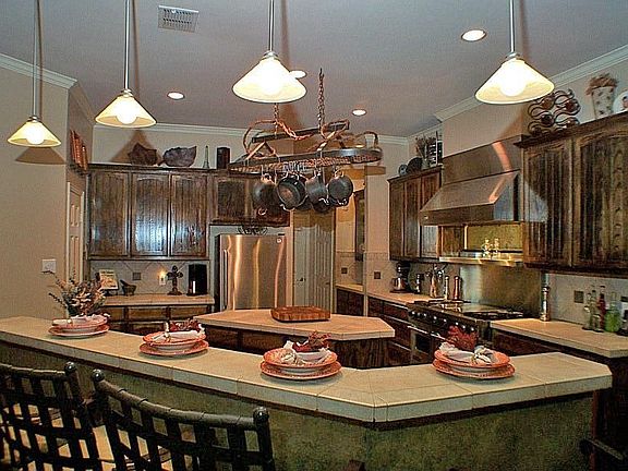 full service bar, island, and 60" Viking range