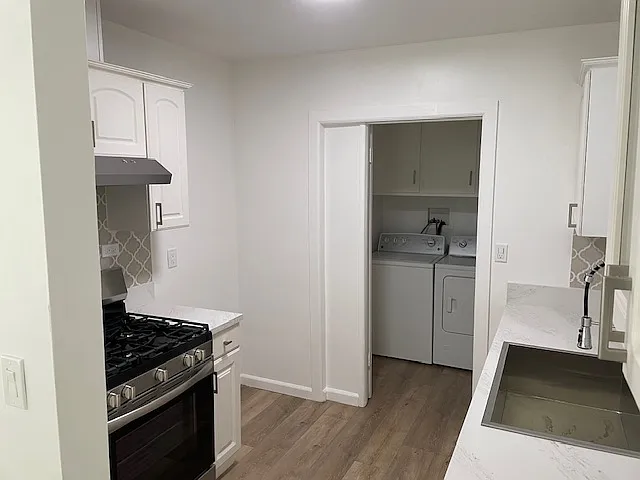 Kitchen view into the laundry room.