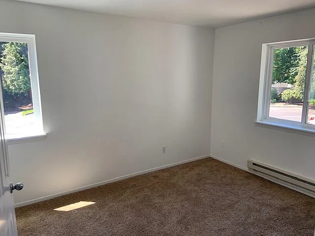 Bedroom #2/Office, with windows and walk-in closet