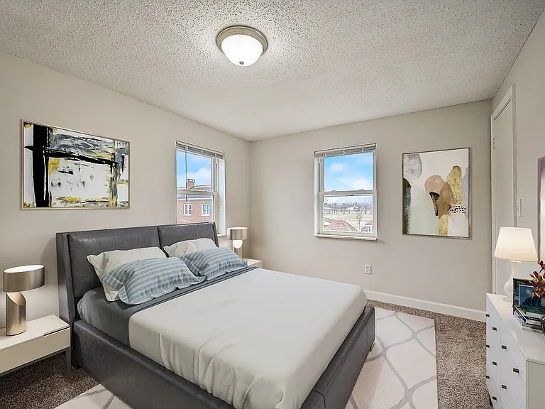 3 BR 2 BA Recently Renovated Townhouse Style Apartments featuring New gray carpet, Neutral paint scheme, Premium hardwood-style flooring, Neutral paint scheme, Upgraded light fixtures, New cabinets, Matching stainless steel appliances, Washer/Dryer, Air c