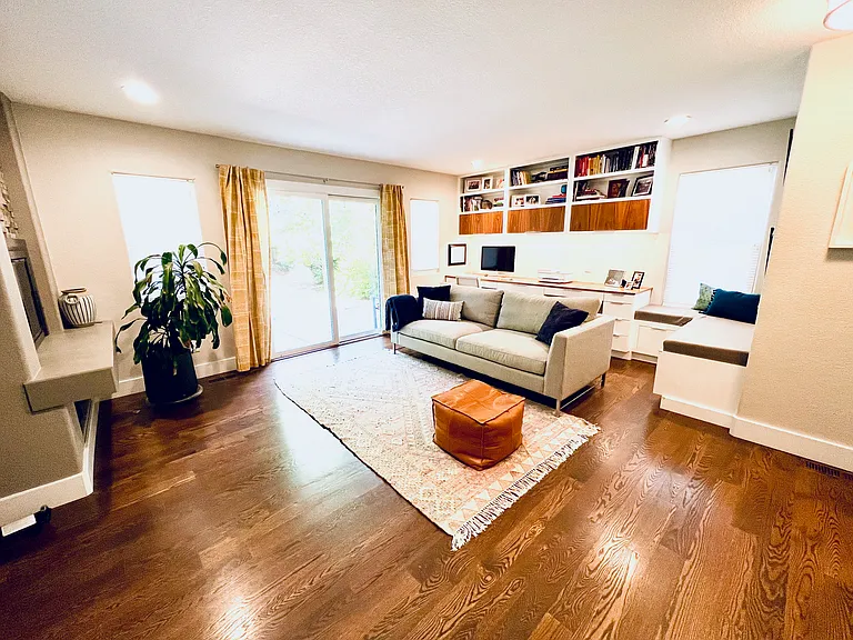 Second living room/office area with access to the patio as well.