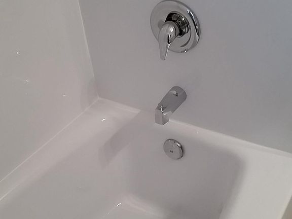 New BathFitter bathtub, walls and fixtures.