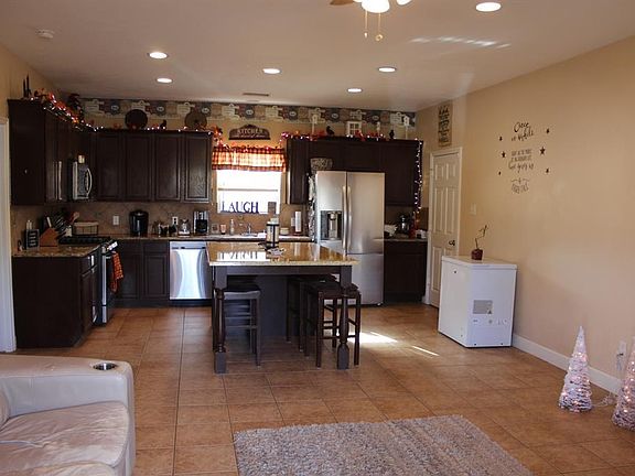 Recessed lighting. Entertain guests around the kitchen island. Cooking can be done while watching the "Game".