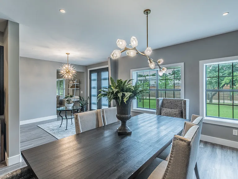 Sophisticated dining with high-end finishes and custom cabinetry.