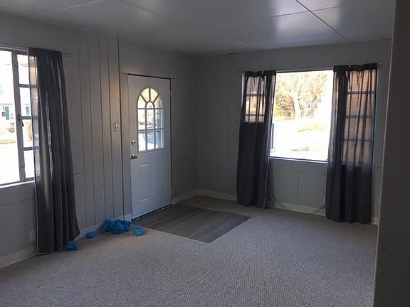 Two large windows in the living room.