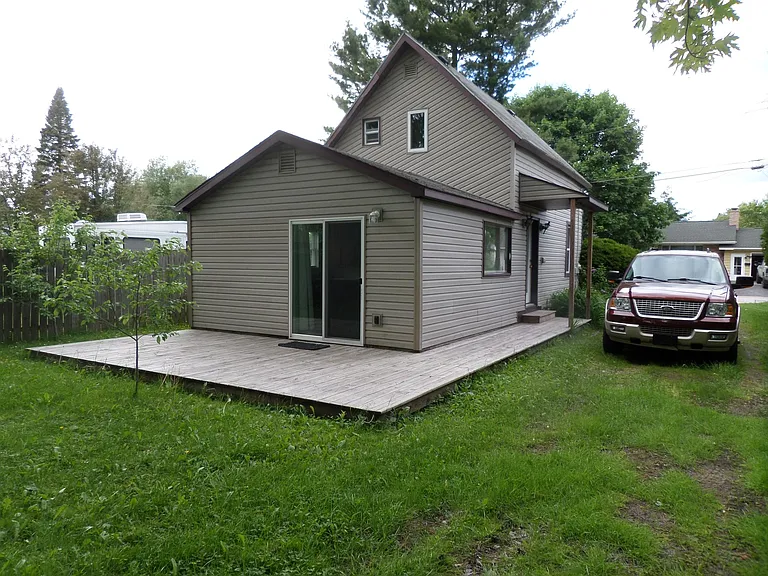 wrap around deck,side yard/driveway