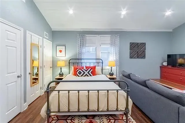 Enjoy abundant natural light during the day, plus blackout curtains for a cozy nighttime atmosphere.