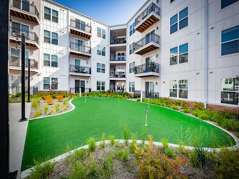 Practice your short game in the courtyard at our custom putting green.