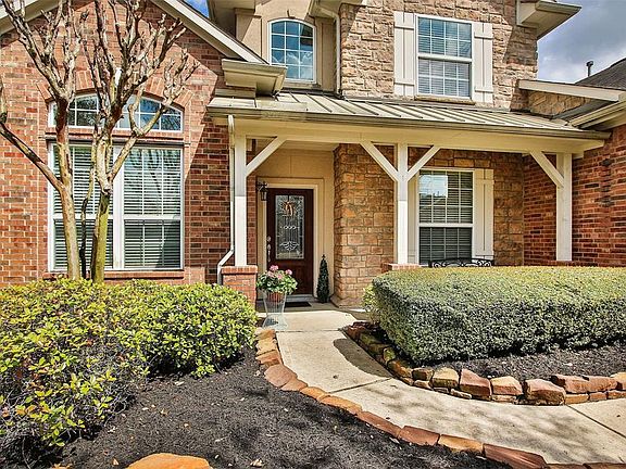 Walk up the charming stone lined walkway and take in the beauty of the curb appeal!