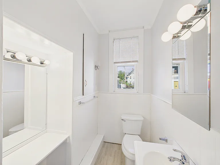 Half bathroom attached to primary bedroom