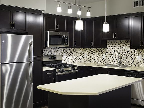 Make your kitchen the heart of the home. Seen here in Espresso color scheme. Choose your favorite look.