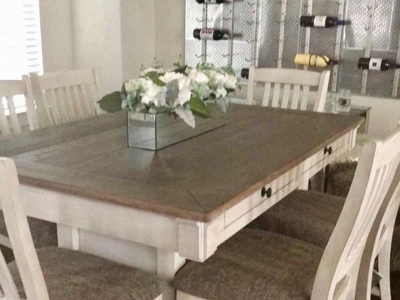 Dining area with, custom built wine wall.