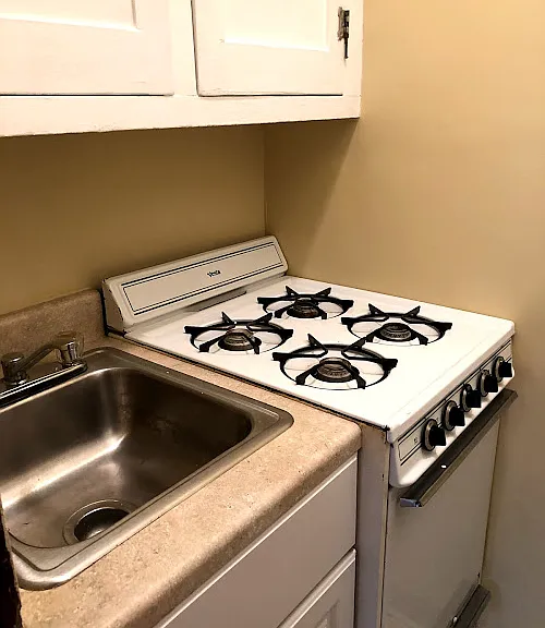 Sink and stove - four burners, oven, broiler