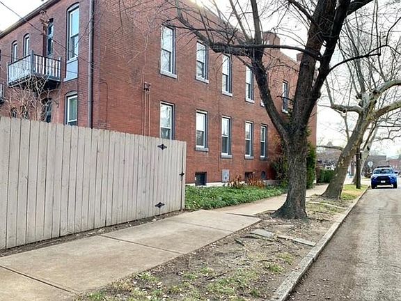 Back yard fence and side entrance.