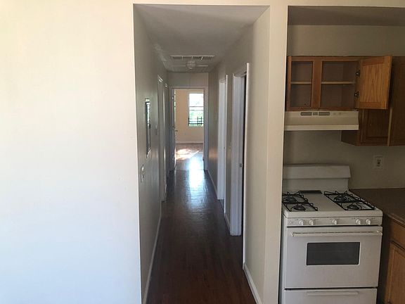 Hallway to bedrooms and bathroom