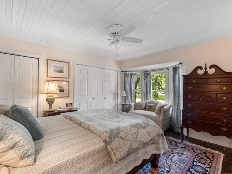 Top floor bedroom with Bay Window, private bathroom, and small private balcony