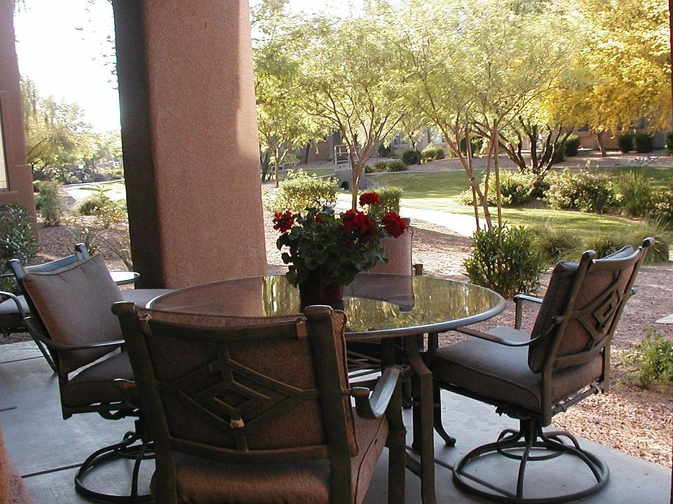 Patio looking out to beautiful landscaped common area.