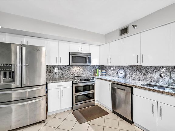 3rd image of 3500 Mystic Pointe Dr APT 3407
