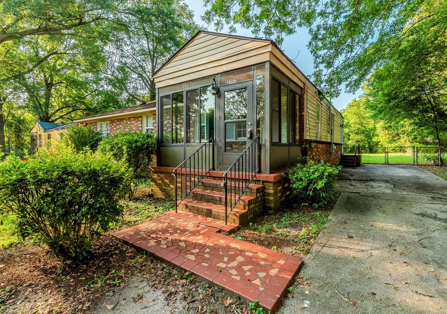 4 bed/2 bath off Olive Road, with fenced back yard! Vouchers Accepted! — Photo 1