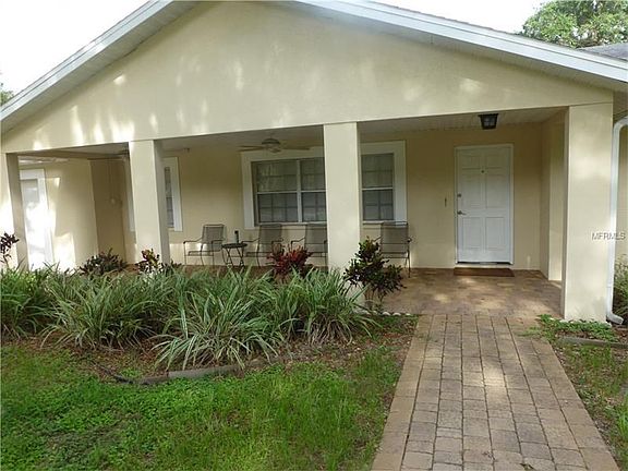 COVERED FRONT PORCH W PAVERS