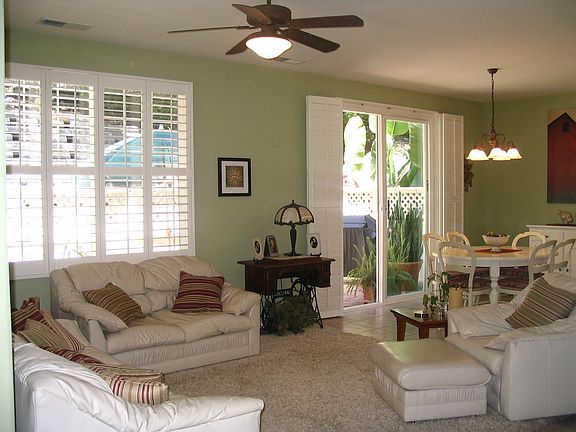 Spacious living area into dining room. Large patio off of dining area.