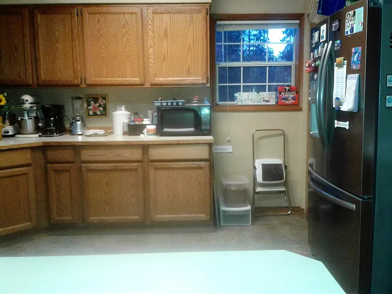 Kitchen with vaulted ceiling and a skylight