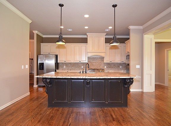 Charming pendant lights above island