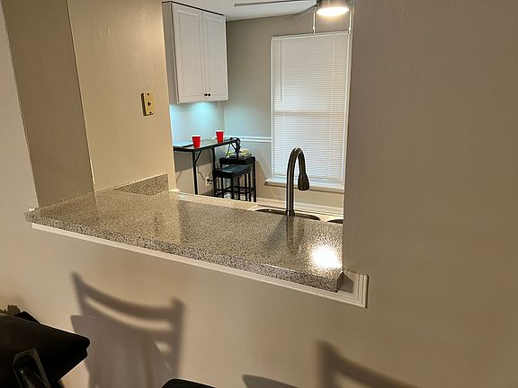 Mini-Kitchen Table with two chairs and power for your phone or laptop provided too