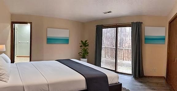 Virtual staging of main bedroom.