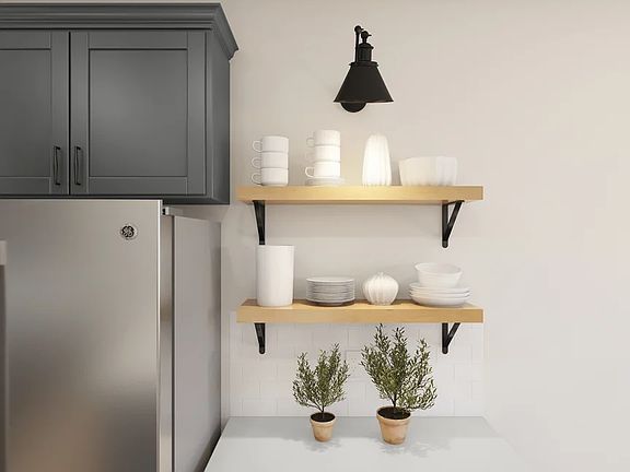 Floating shelves and sconce lighting