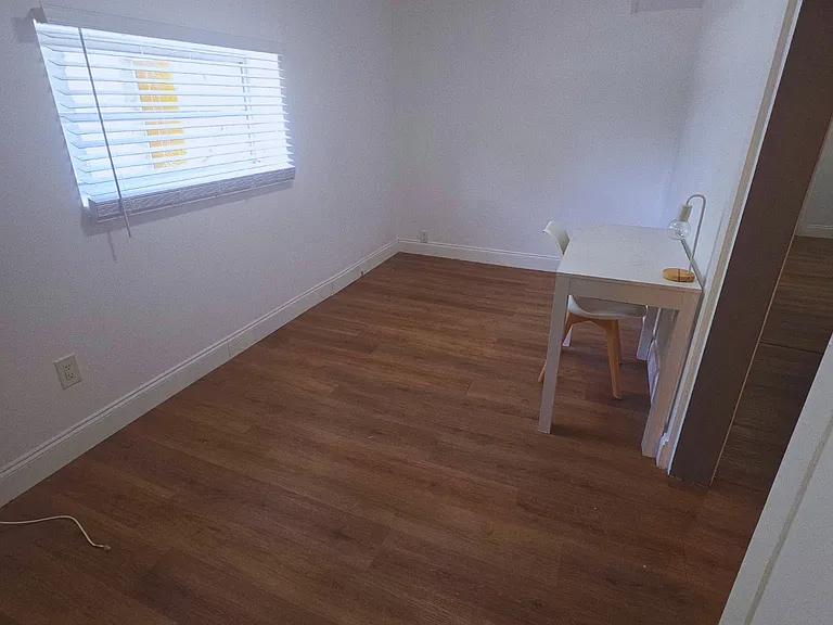 Dedicated workspace with two desks and chairs for work or study.