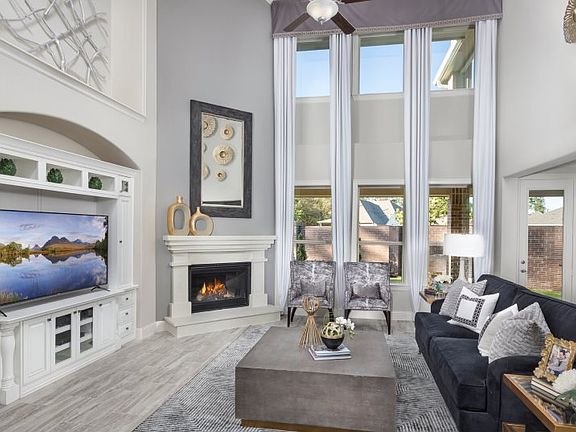 An elegant space for entertaining or relaxing, the comfortable family room boasts and airy design wi