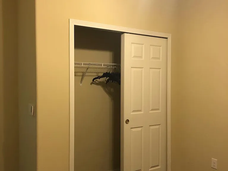 Walk-in closet in 5th bed