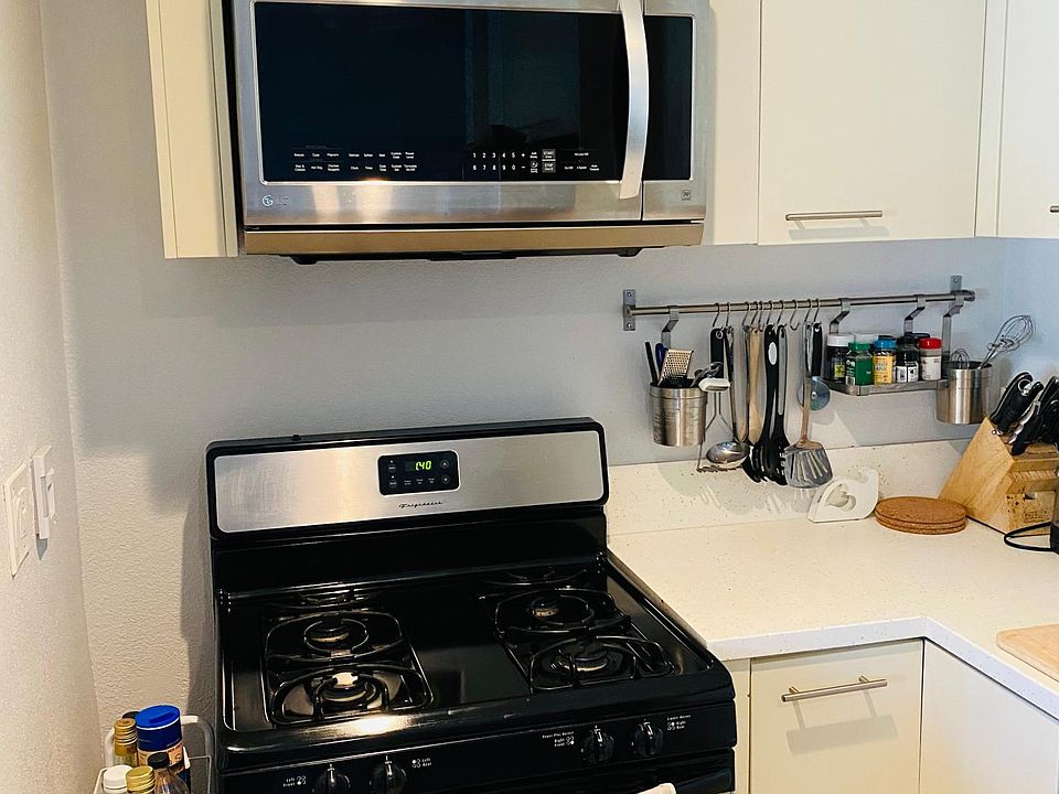 Frigidaire gas stove with with vent and light, oven with broiler. LG Microwave. Frigidaire dishwasher with delay timer, efficient modes, and heated dry.