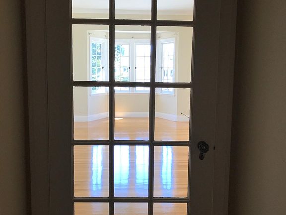 Up flight of stairs - Door to Living Room