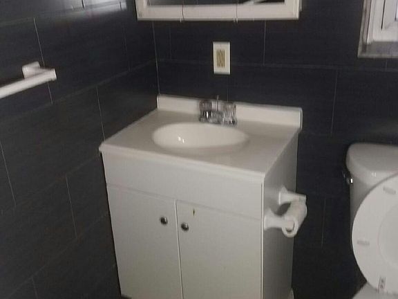 3rd image of 1065 E 99th Street # Top Floor