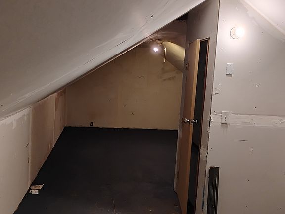 Huge attic not for habitation but equal to two rooms.