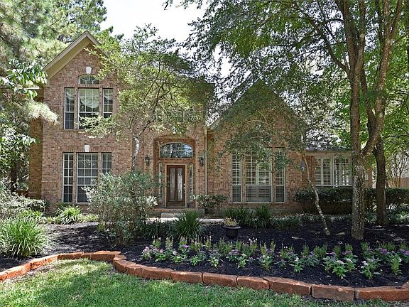 Beautiful Curb Appeal with fresh landscaping, mulch and naturel rock borders.