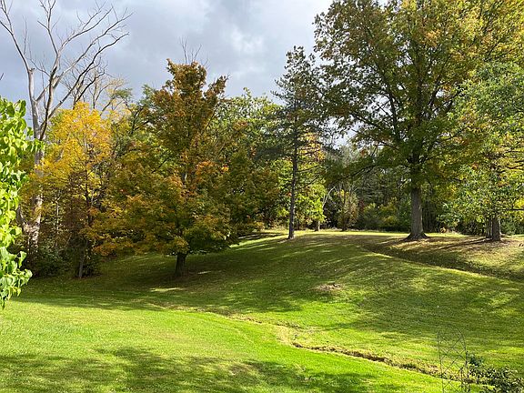 Beautiful rolling lot with many mature trees