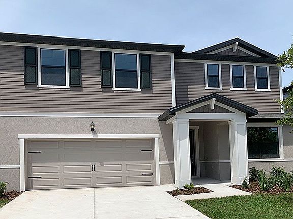 Sandalwood Coastal elevation new home front exterior William Ryan Homes Tampa