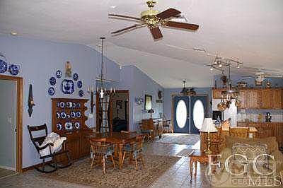 From the family room looking towards the front doors. Split bedroom floor plan.