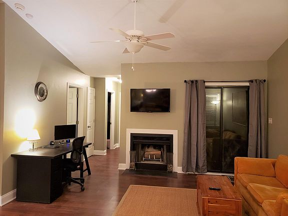 Living Room has a nice desk/work station with monitor and high-speed wireless internet