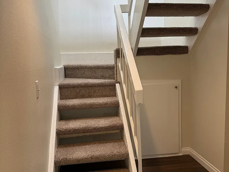Stairs to Loft and Bonus Room w/ Laundry