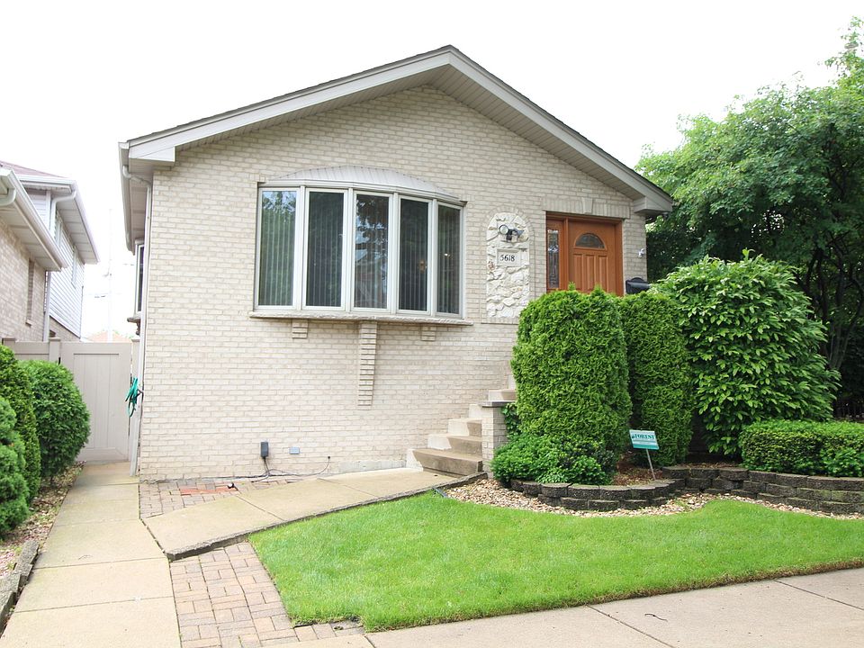 1st image of 5618 S Newland Ave