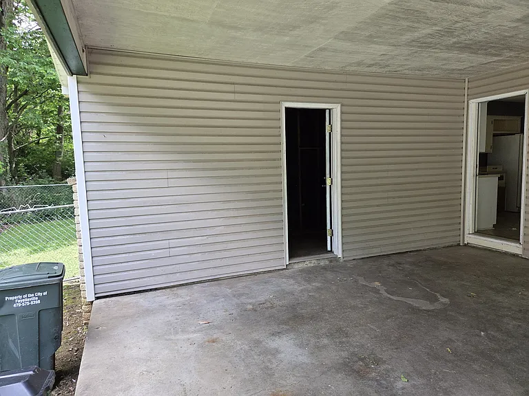 Huge storage at end of carport