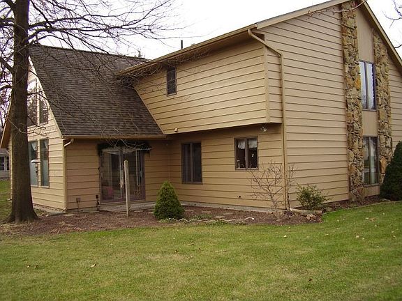 Back of the home, sunroom added late 1980's