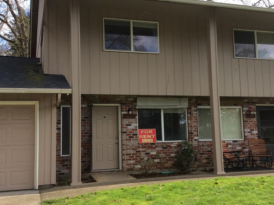 Unit is on far left. Unit's garage is far left.