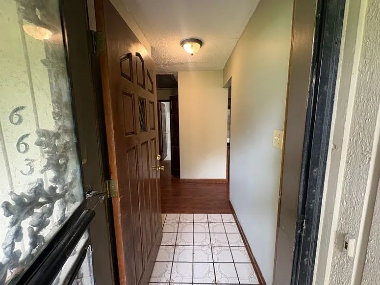 Spacious Brick Home with Fireplace, Attached Garage & Fenced Yard — Photo 2