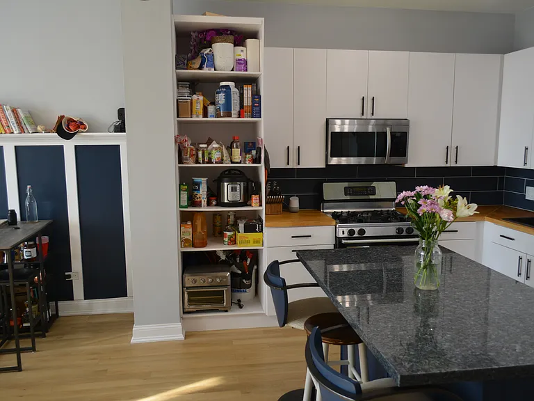 HUGE, custom, 8' pantry gives you plenty of storage room